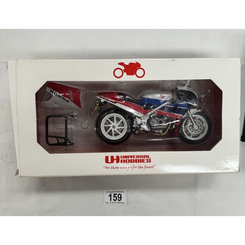 159 - A Minichamps 1/12 Cal Crutchlow signed 2011 Yamaha YZR-1 with COA & Universal hobbies Honda RC30