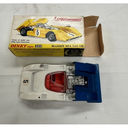 165 - A boxed Dinky 223 Mclaren, other dinkys & Britains 4.7 navel gun