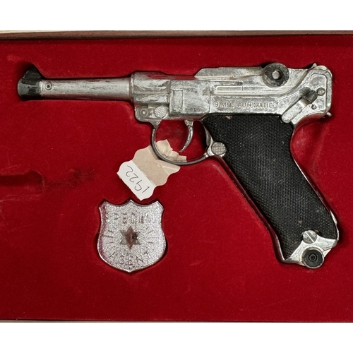 187 - A boxed Lone Star Luger presentation set. Incomplete  A 7.63mm automatic toy gun A/F, & A catapult A... 