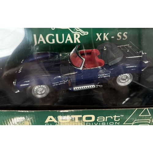 188 - An Auto Art 1/18 Jaguar XK-SS in blue.