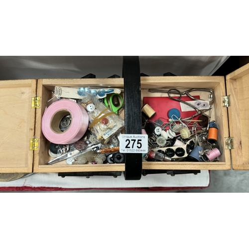 275 - A vintage concertina sewing box and contents and a button box containing buttons