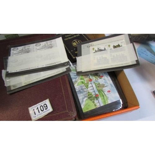 1109 - A Capitol stamp album with stamps, a quantity of Britains miniature sheets presentation packs etc.,