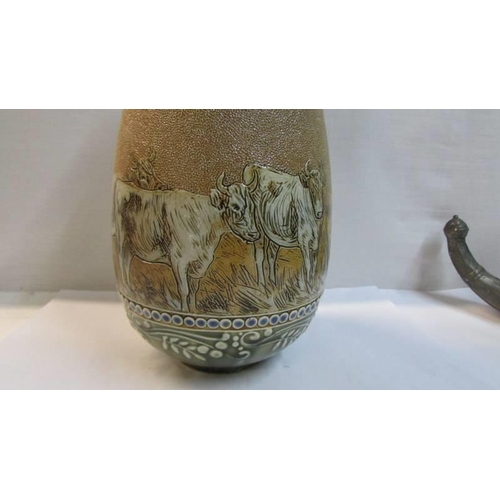 1120 - A Hannah Barlow Royal Doulton hand painted vase featuring cattle, donkeys and sheep