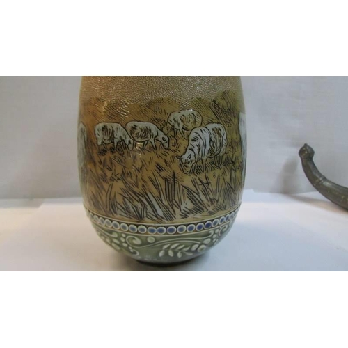 1120 - A Hannah Barlow Royal Doulton hand painted vase featuring cattle, donkeys and sheep