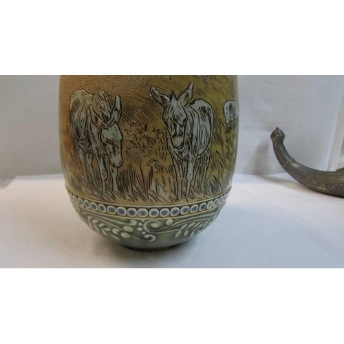 1120 - A Hannah Barlow Royal Doulton hand painted vase featuring cattle, donkeys and sheep