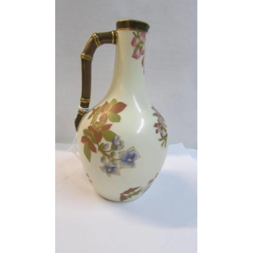 1121 - A fine Royal Worcester porcelain hand painted ewer.