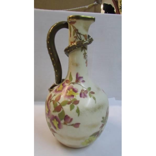 1122 - A fine Royal Worcester porcelain hand painted ewer with dragon handle.