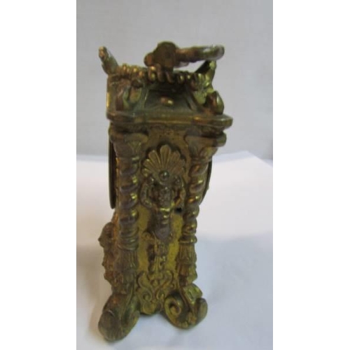 1126 - A French ormolu carriage clock.