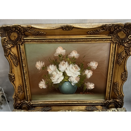 292 - A pair of gilt framed oil on canvas still life Roses both signed indistinct. 34 x 29cm