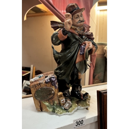 300 - A pottery figure of a French tramp. Height 31cm