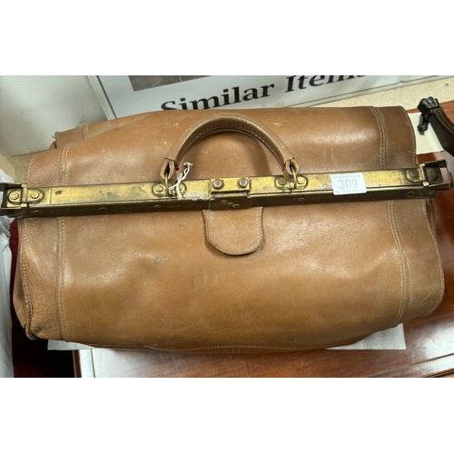 309 - A vintage Gladstone bag