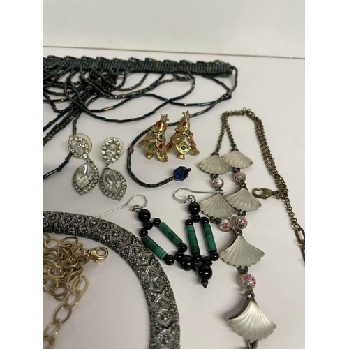 657 - A quantity of necklaces, pendants & earrings