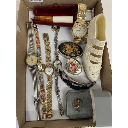 665 - A quantity of lady's watches, rings and charms etc