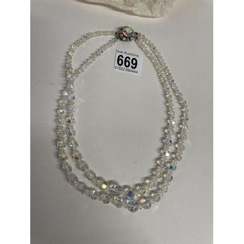 669 - A Vintage Tiara and a Two strand crystal necklace