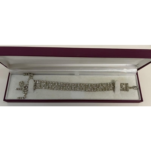 656 - A Jewellery box with 3 bracelets, cuff links & tie pin