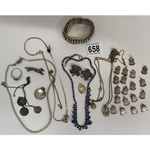 658 - A quantity of necklaces & charms etc.