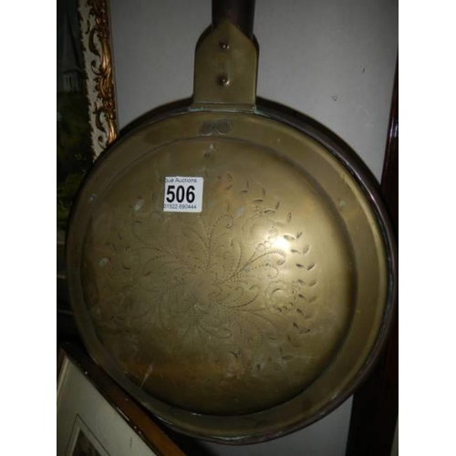 506 - A Victorian brass and copper warming pan, COLLECT ONLY.