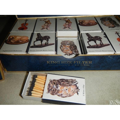 520 - Two complete boxes of Sotheby's match boxes.