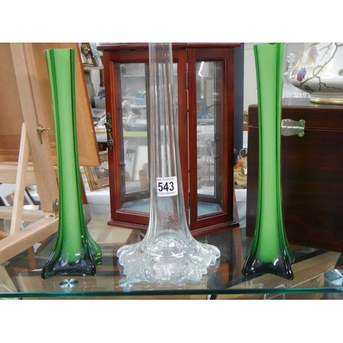 543 - A tall clear glass specimen vase and a pair of green glass specimen vases, COLLECT ONLY.