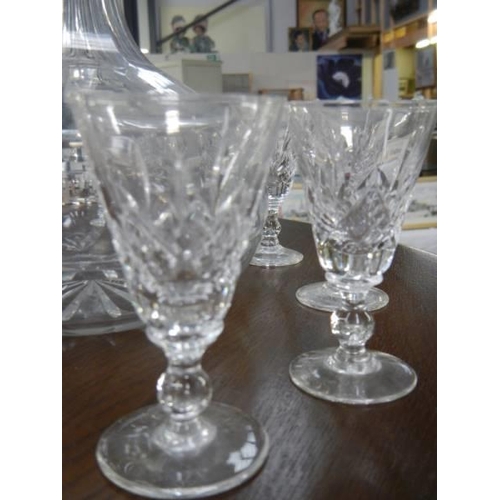 550 - A cut glass decanter and six sherry glasses. COLLECT ONLY.