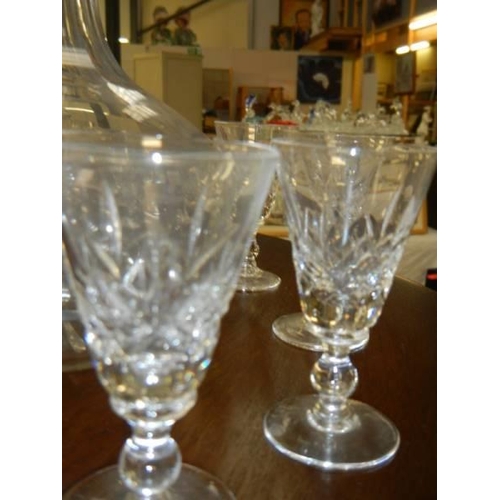 550 - A cut glass decanter and six sherry glasses. COLLECT ONLY.