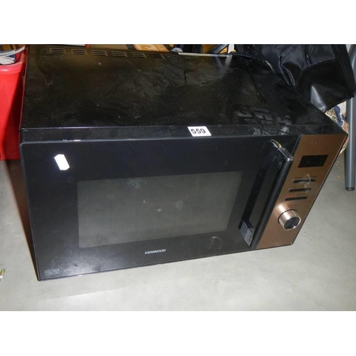 559 - A good Kenwood microwave oven, COLLECT ONLY.