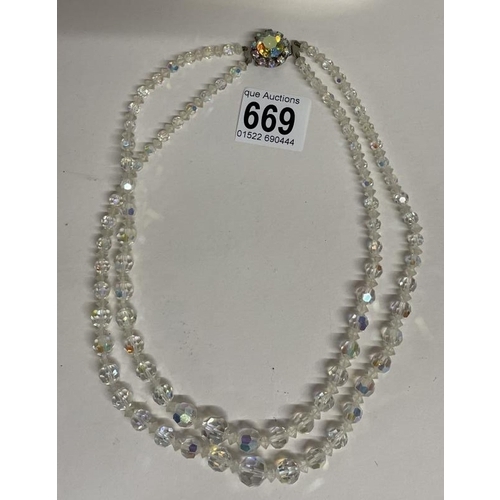 669 - A Vintage Tiara and a Two strand crystal necklace