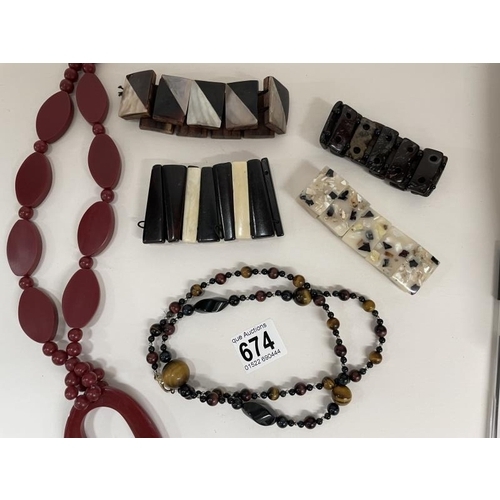 674 - Two contemporary necklaces and four bracelets