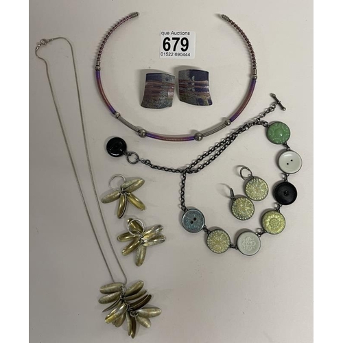 679 - Two necklaces with matching earrings, a LuLu Guinness key ring etc.