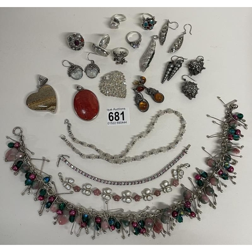 681 - A mixed lot of necklaces, pendants, rings etc