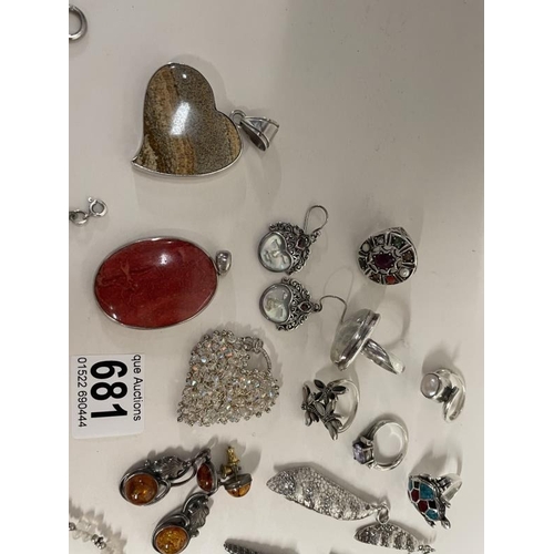 681 - A mixed lot of necklaces, pendants, rings etc