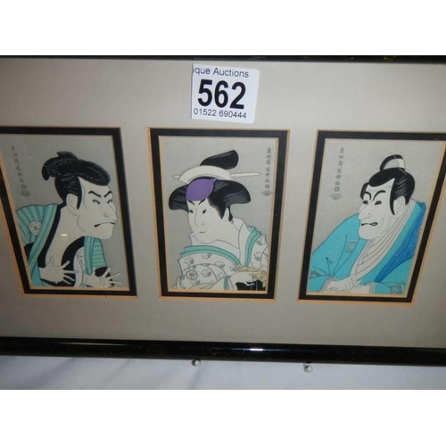 562 - Three oriental watercolours in a single frame.