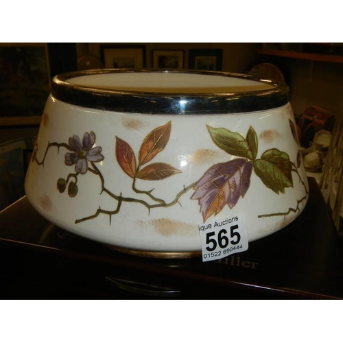 565 - A good old hand painted fruit bowl with silver plated rim.