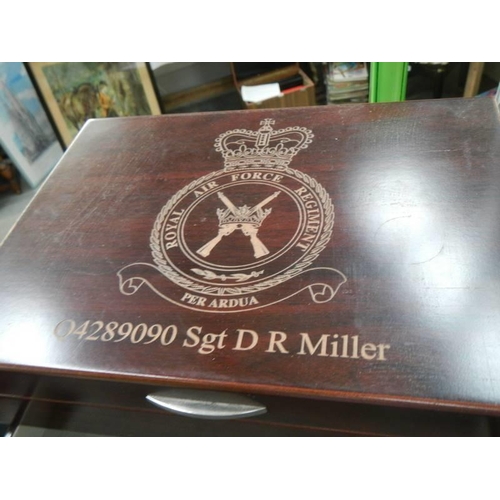 566 - A good mahogany jewellery cabinet marked Sgt D R Miller.