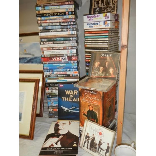 579 - A large quantity of DVD's and CD's. COLLECT ONLY.