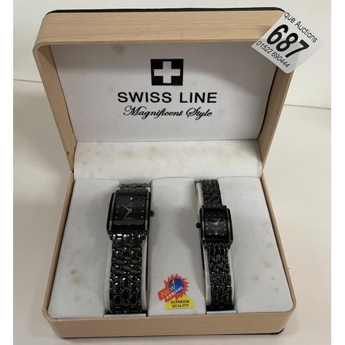 687 - A boxed Pulsar gent's watch and boxed Swiss line gent's and lady's watch set