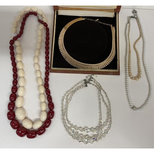 690 - A quantity of necklaces including crystal, pearl etc