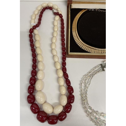 690 - A quantity of necklaces including crystal, pearl etc