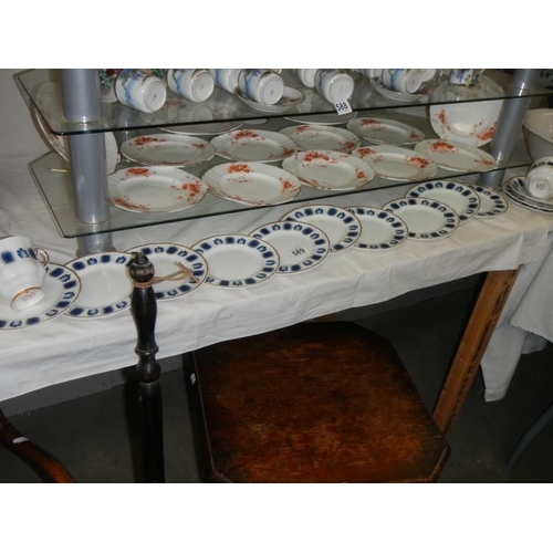 589 - Two shelves of assorted tea plates. COLLECT ONLY