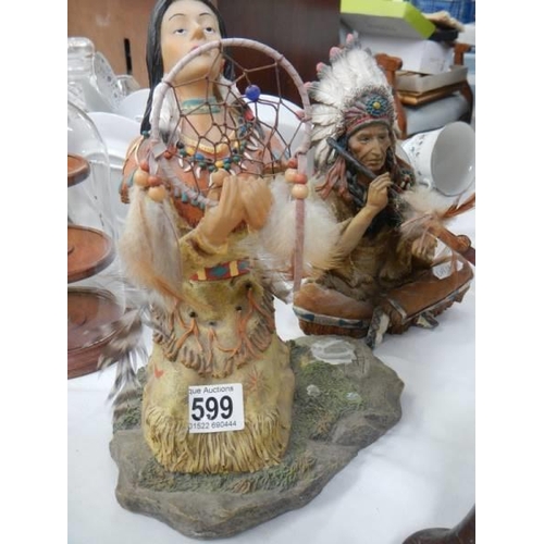 599 - Two Native American Indian figures.