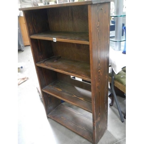 604 - A stained pine book case. COLLECT ONLY.