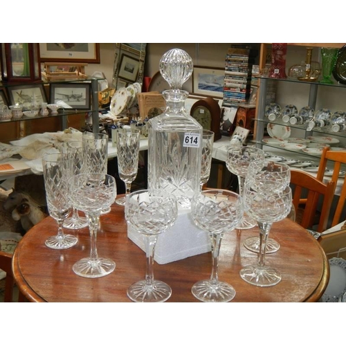 614 - A cut glass decanter and two sets of six glasses. COLLECT ONLY.