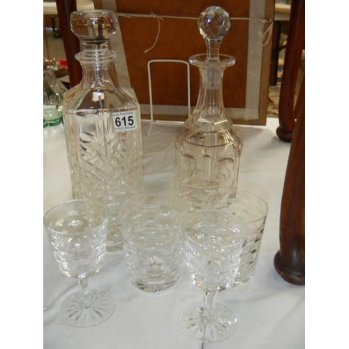 615 - Two decanters and a quantity of glasses. COLLECT ONLY.