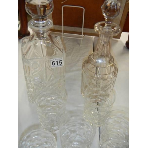 615 - Two decanters and a quantity of glasses. COLLECT ONLY.