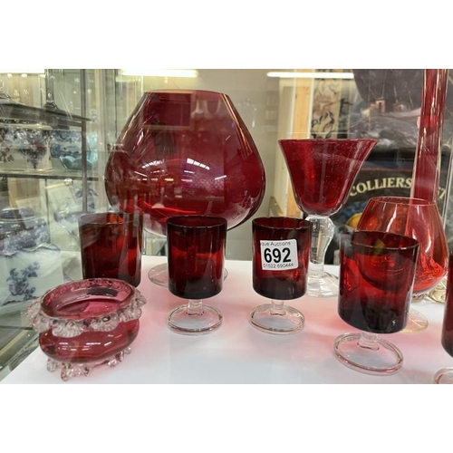 692 - A quantity of cranberry red glassware including 6 glasses