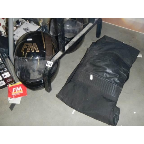 636 - Two motor cycle helmets and trousers. COLLECT ONLY