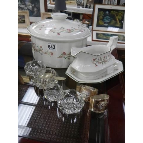 643 - A tureen with matching gravy boat, glass salts and napkin rings. COLLECT ONLY