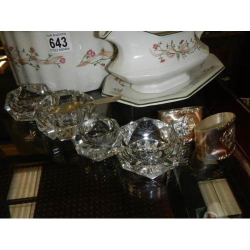 643 - A tureen with matching gravy boat, glass salts and napkin rings. COLLECT ONLY