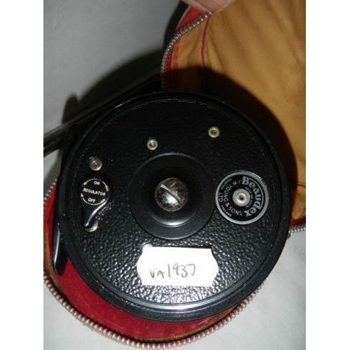 712 - A Beaudex J W Young & Sons fly fishing reel in Hardy Bros. pouch.