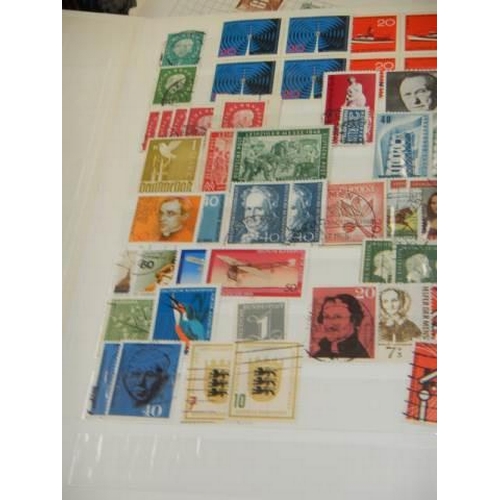 754 - A large tray of stamps and first day issues.